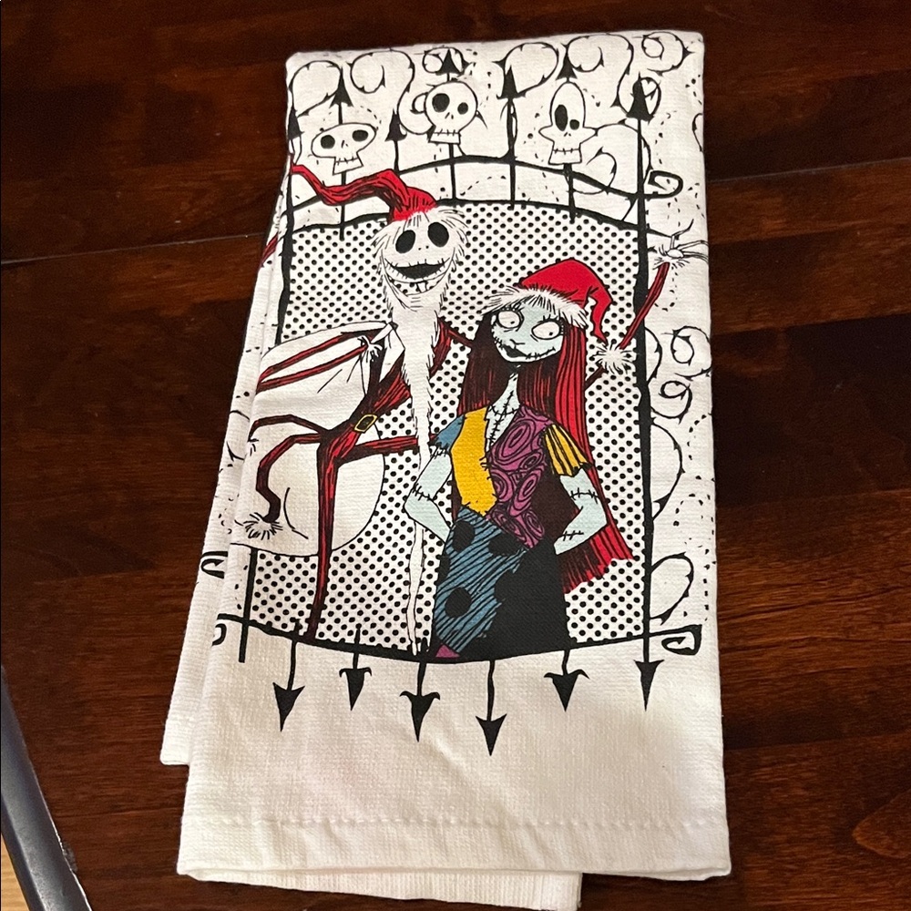 Disney White Towel with Red Tag. 
Nightmare before Christmas dish towel